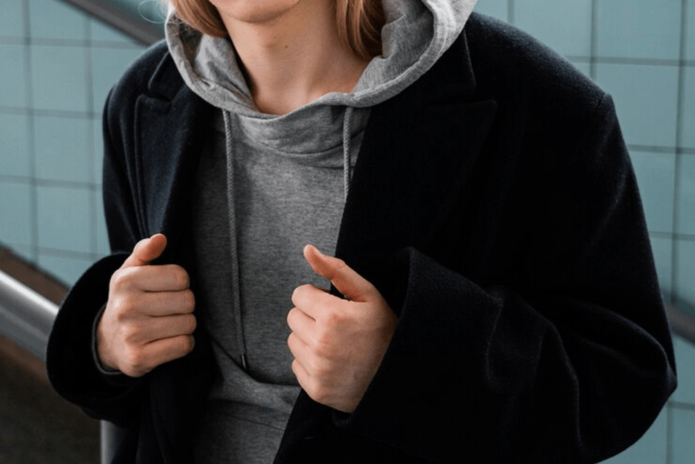 1. The layered look: hoodie under a jacket